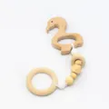 Swan-shaped beech wood baby teether with white silicone beads and natural wooden rings - Swan Style (Flamingo)