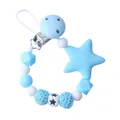 Baby silicone pacifier clip with blue star beads and crochet balls on white background - Blue