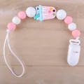 Detail of pink silicone pacifier clip with cute ice cream beads on wood background - Ice Cream-Pink
