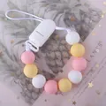 Dettaglio catenella portaciuccio con perle in silicone colorato e clip in plastica - Marmo Rosa Giallo Bianco