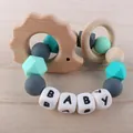Hedgehog silicone and beech wood baby teether rattle toy with colorful sensory beads - Hedgehog