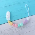 Detail of macaron silicone beads and plastic clip for baby pacifier chain - Yellow Style