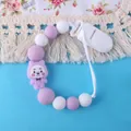 Detalle de sujetachupetes de silicona con oso morado y cuentas suaves para bebés - Púrpura
