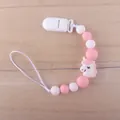 Detail of baby pacifier clip with pink and white silicone beads and unicorn pendant - Pink Unicorn