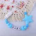 Sky blue silicone pacifier clip with star and heart beads featuring BABY letter beads - Blue