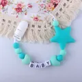 Silicone pacifier clip with mint green beads and star pendant featuring BABY lettering - Green