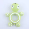 Green turtle silicone baby teether with textured massaging surfaces for teething relief - Green
