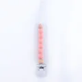 Detail of pink silicone beads and wooden clip on a baby pacifier chain accessory - Flesh Pink