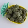 Perles crochetées de 20mm en coton vert olive pour bijoux DIY dans un bol déco - 20mm / Vert Avocat
