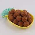 Dark brown 16mm crochet cotton balls for DIY jewelry crafts on a pineapple tray - Light Coffee