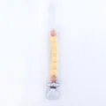 Pale yellow silicone pacifier clip with natural wooden beads and secure white clamp - Light Yellow