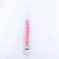 Pink and wood silicone bead pacifier clip with secure safety clip for babies - Barbie Pink