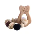 Handmade beech wood owl teether with neutral crochet beads for infant sensory play - Owl