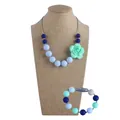 Set collana e bracciale in silicone blu e menta con rosa per la dentizione dei neonati - Collana E Bracciale / Blu chiaro