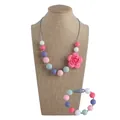 Set collana e braccialetto da dentizione in silicone pastello con ciondolo a rosa rosa - Collana E Bracciale / Multicolore