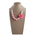Pink and white silicone teething necklace with rose flower pendant for infants - Necklace / Pink