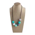 Silicone teething necklace with green, gray and white geometric beads for babies - Lake Blue
