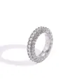 Macro shot of silver hip-hop ring featuring three rows of pave-set cubic zirconia stones - US 7 / Silver