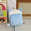 Fluffy blue and white plush backpack with cute bear ears and fuzzy ball charm detail - Blue