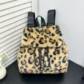 Faux fur drawstring backpack featuring classic leopard print pattern and plush texture - Classic Tan Leopard (Style 9)