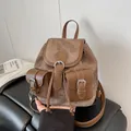 Vintage dark brown denim and PU leather backpack with buckle pockets and drawstring - Brown