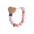 Pink heart-shaped beech wood and silicone bead baby pacifier clip chain on white background - Pink