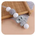 Silicone baby teether chain featuring white beads and a gray elephant pendant charm - Gray