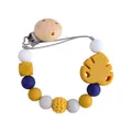 Catenella portaciuccio DIY con perline in silicone blu e massaggiagengive foglia - Curcuma