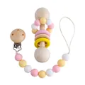 Wooden baby rattle and silicone pacifier clip set in macabre pink and yellow colors - Pink