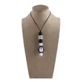 Silicone teething necklace with a cute black penguin pendant and marble beads - Penguin