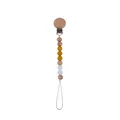 Beech wood pacifier clip with yellow and white silicone beads for baby teething - Turmeric