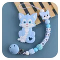 Beißring-Set aus blauem Silikon mit Wolfsmotiv und Holzklemme für Babys - Blau Set