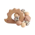 Hedgehog-shaped beech wood baby teether with terrazzo silicone beads and wooden rings - Teething Gelatin / Light Yellow