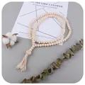 Natural wood bead curtain tieback with a cream tassel and large sphere detail - Heart Medium Style (2#)