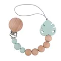 Wooden and mint green silicone pacifier clip with leaf shaped teething pendant - Light Green