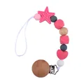 Silicone pacifier clip with pink star and heart beads on a natural wooden clamp - Watermelon red