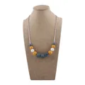 Silicone teething necklace for babies with grey, yellow and white geometric beads - Turmeric