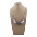 Pink, white and grey silicone teething necklace with geometric beads on display - Light Purple