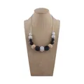 Silicone teething necklace with black, white and wooden beads for nursing infants - Black