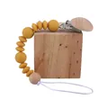 Silicone pacifier clip with ginger yellow beads and beech wood holder for babies - Turmeric