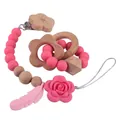Pink silicone and beech wood baby teether pacifier clip set with flower charms - Flower