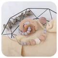 Handmade beech wood elephant teether and silicone pacifier clip set in a basket - Light Gray