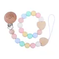 Pastel silicone and wood baby pacifier clip and heart teether ring set in pink and blue - Macaron Set