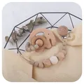 Natural beech wood elephant teether set with silicone pacifier clip on knit blanket - Khaki