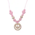 Pink silicone and wood teething necklace with heart beads and a smiley face pendant - Pink