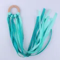 Sensory beech wood ring with teal and mint green silk ribbons for baby visual tracking - Green