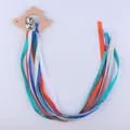 Dinosaur wooden teething ring with colorful silk ribbons and small metal bells - Dinosaur