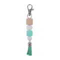 DIY tassel keychain with mint green silicone beads and natural wood cube on white background - Mint Green