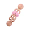 Pink crochet balls and wooden rings on a beech wood rattle toy for infant teething - Pink