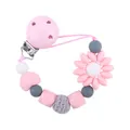 Sujeta chupetes de silicona rosa con cuentas de colores y una linda flor de girasol - Rosa